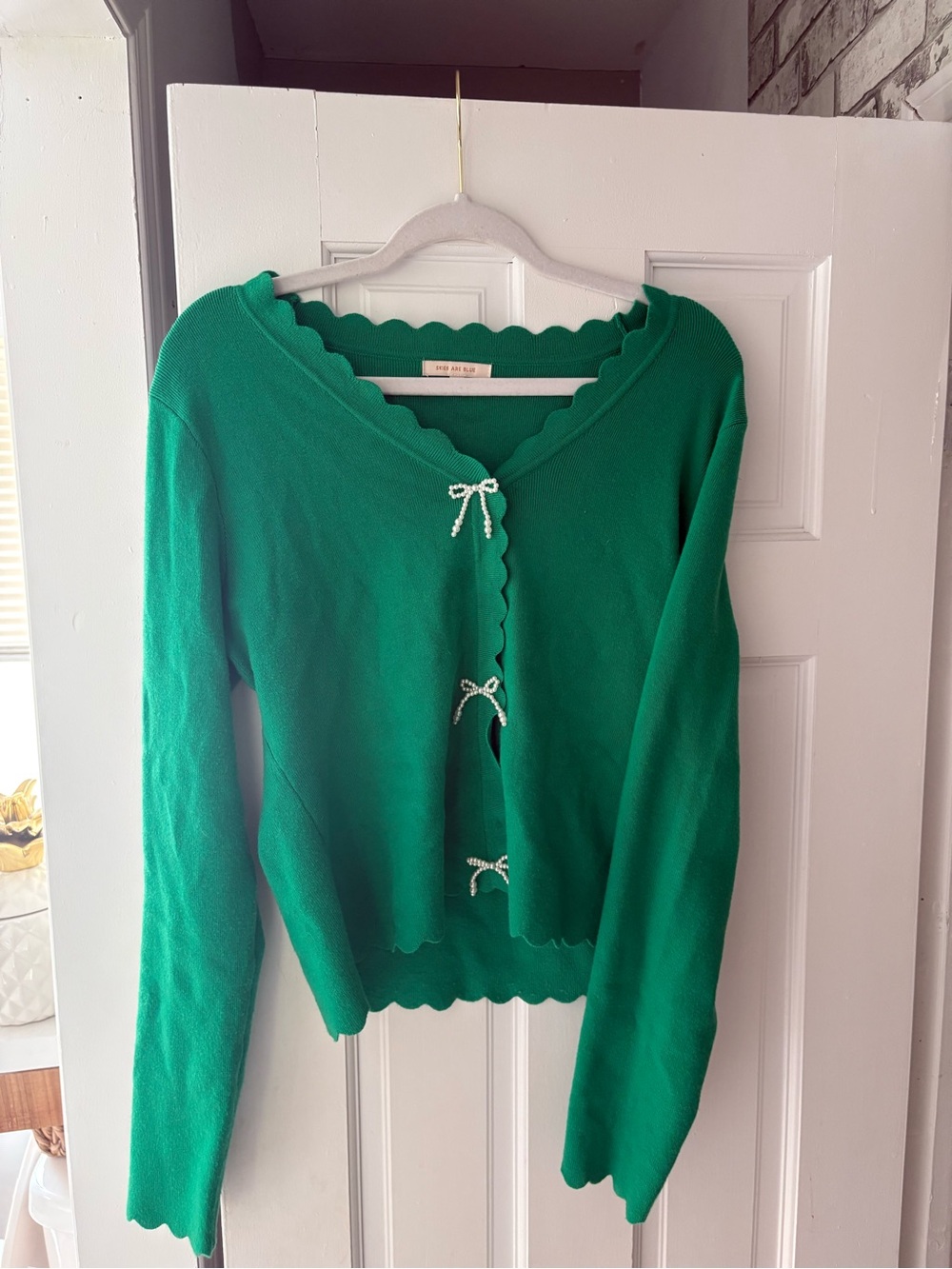 Worn once Green Scalloped Edge Cardigan with Bow Closures